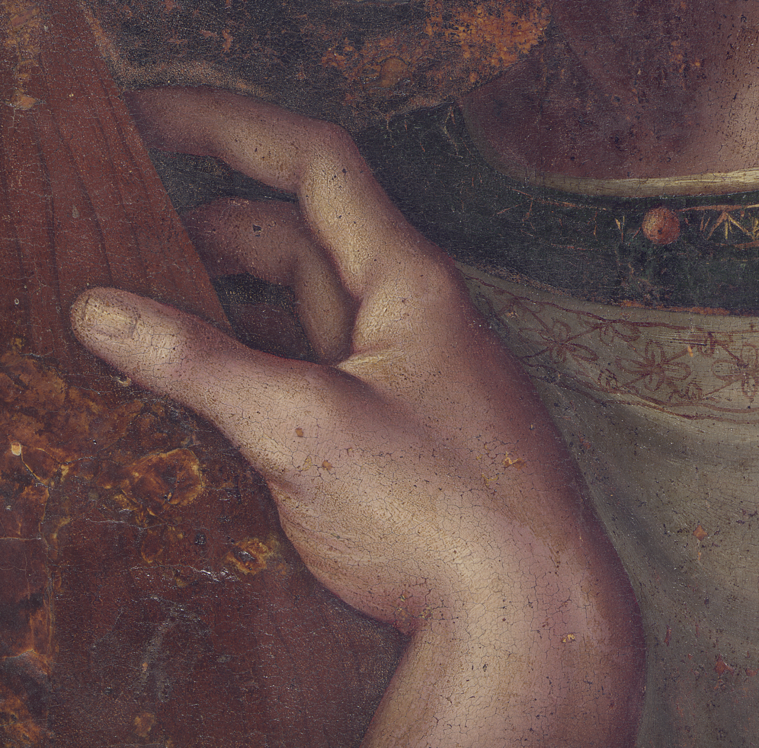 Close-up of Christ’s right hand gripping the wooden cross in the painting under study.