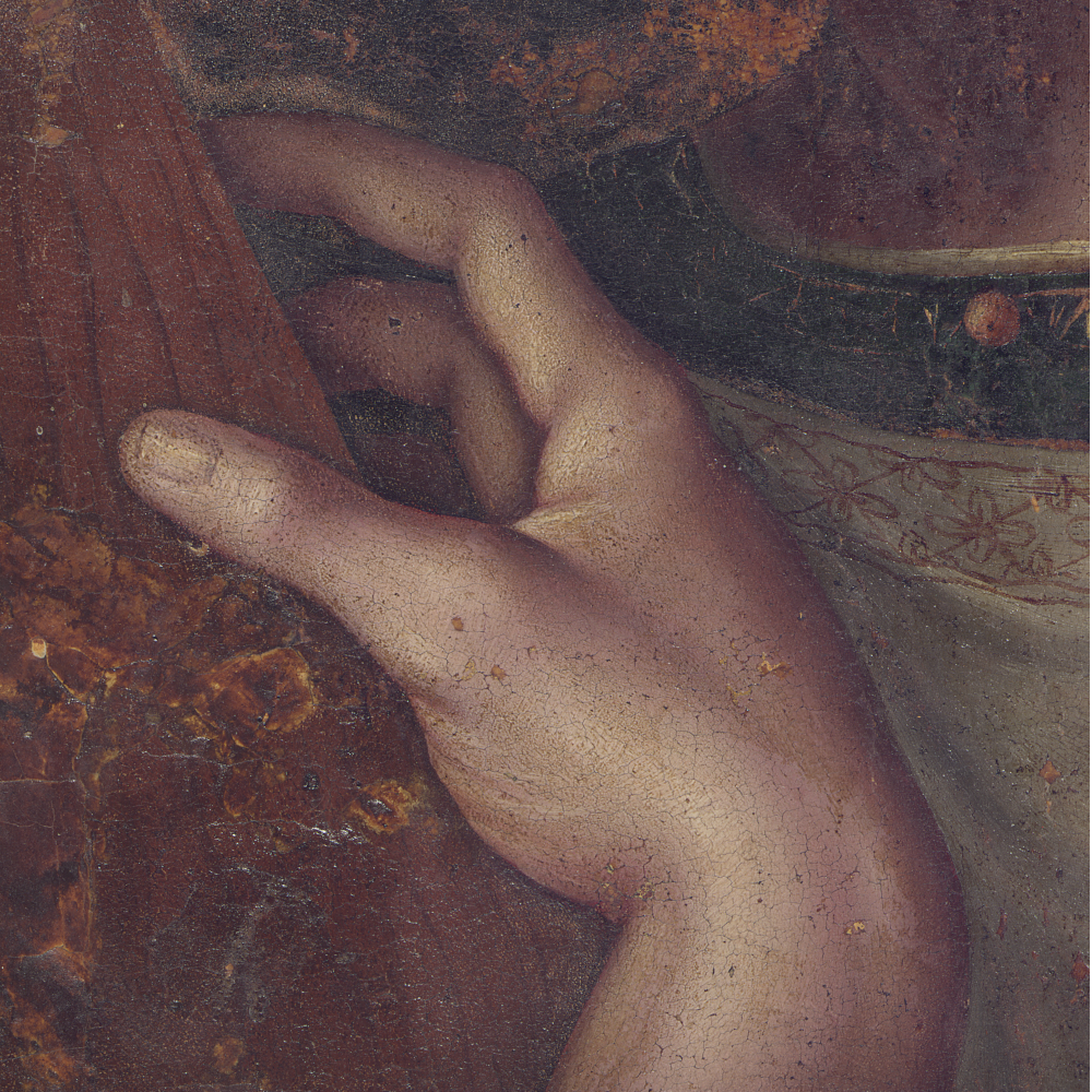 Christ’s right hand holding the cross in the painting, with the thumb extended and the fingers curled around the wood.